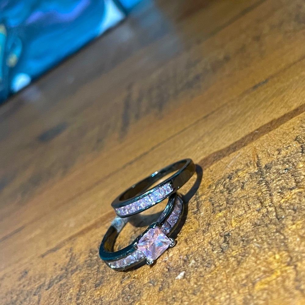 Black tinted ring with pink diamonds. 2 piece set.